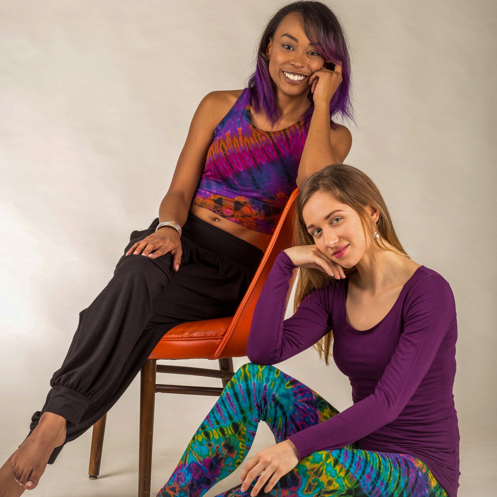 Two girls posing in thai-dye by malisun