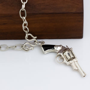 Silver Revolver Pendant on Handmade Thai Chain